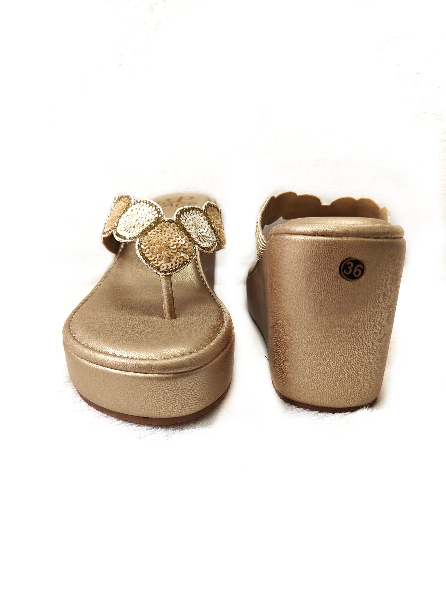 Page Radiant Gleam Wedge Gold (1200).